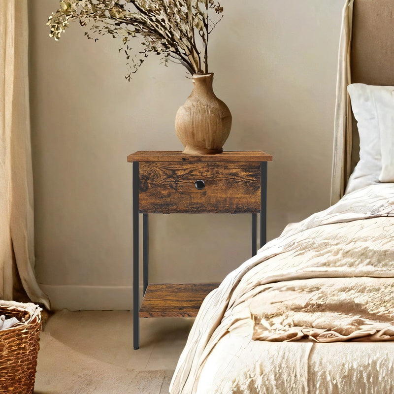 Bedside table shown beside a bed in a bedroom setting