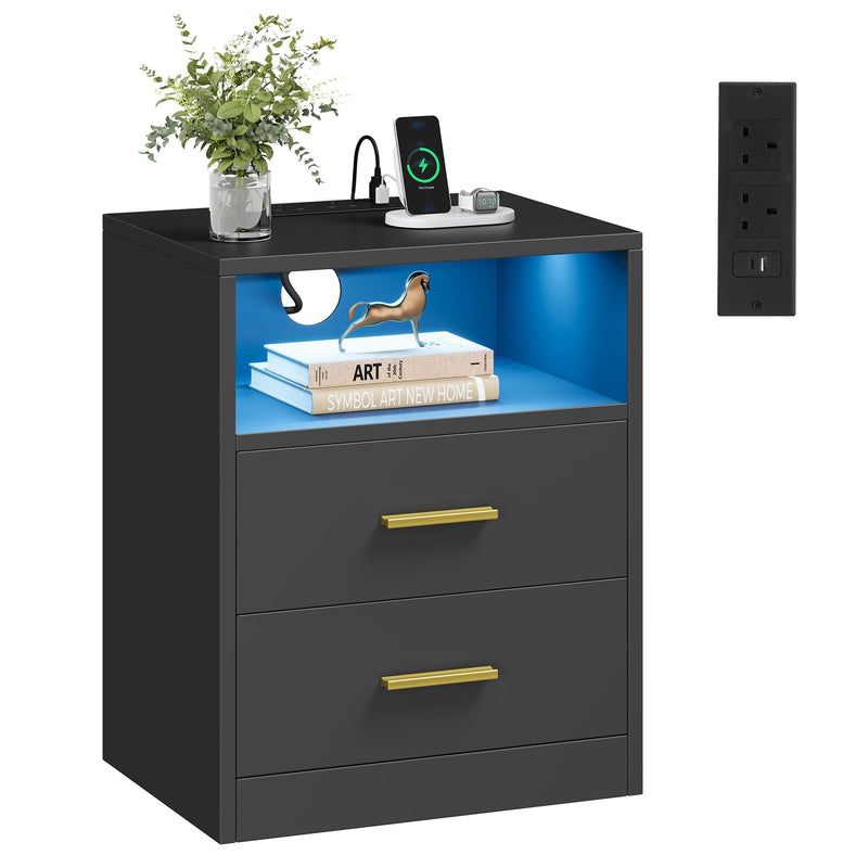 Bedside table with LED-lit open shelf, two gold-handled drawers and a phone charging on top, studio view
