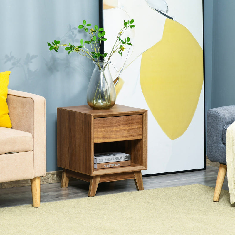 Bedside table used as a side table next to a sofa in a living room