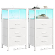 Two Cloud White Songmics bedside tables side by side, each with a lit open shelf and 3 fabric drawers, on a plain background