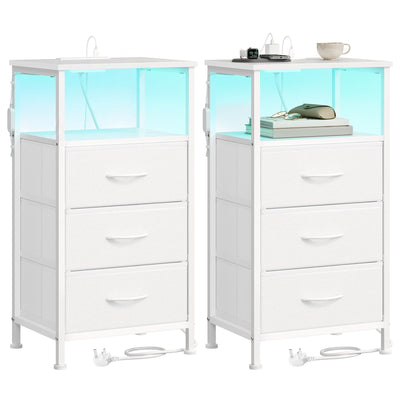 Two Cloud White Songmics bedside tables side by side, each with a lit open shelf and 3 fabric drawers, on a plain background