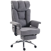 Dark grey big and tall massage office chair with pull-out footrest on a chrome base