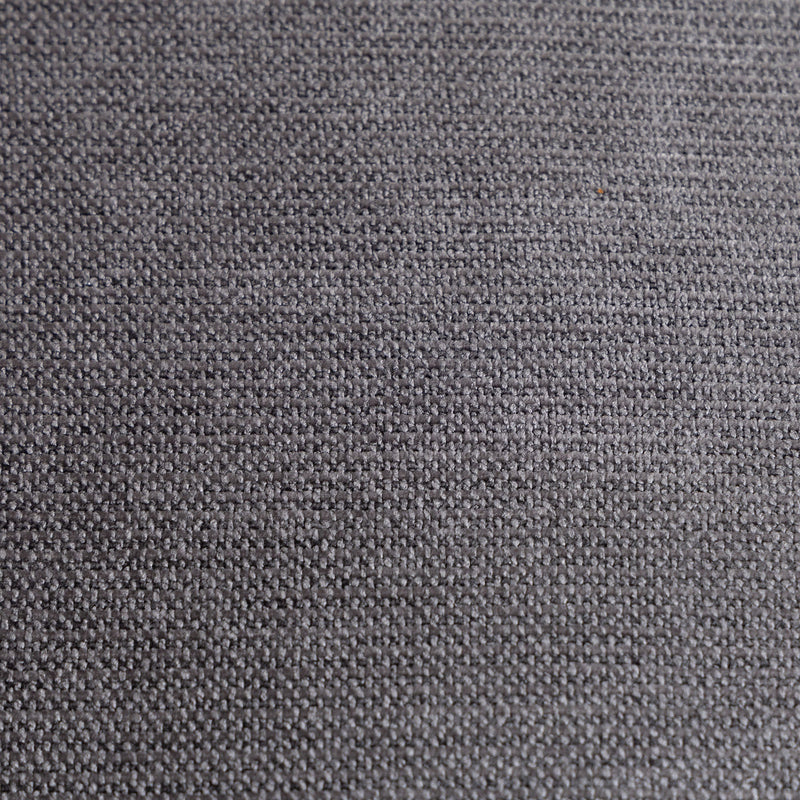 Close-up of the woven grey fabric texture on the chair
