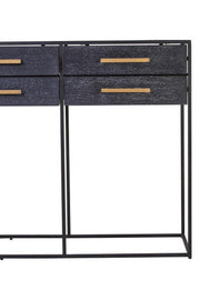 Close-up of a slender gold-finish drawer handle on the black oak veneer drawer front