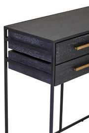 Close-up of the black oak veneer surface showing subtle grain under the deep black finish