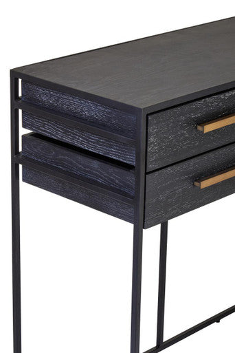 Close-up of the black oak veneer surface showing subtle grain under the deep black finish