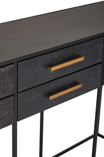 Close-up of the angular black iron base where it meets the console table carcass