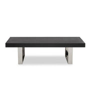 Rectangular black ash elm coffee table with silver stainless steel legs on a plain background