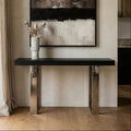 Black ash elm wood console table with silver steel sledge base in a styled room setting