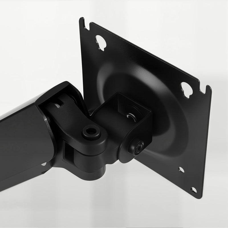 Close-up of the black tilting monitor mounting plate on the arm