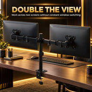 Two screens side by side on the dual monitor stand in a dark home office setup