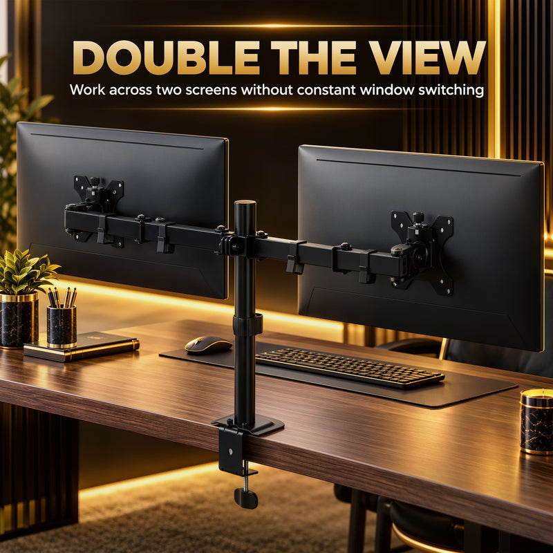Two screens side by side on the dual monitor stand in a dark home office setup