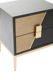 Close-up of the grained gold-finish panel and diagonal fluting detail
