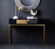 Fluted console table in an entryway setting with a mirror above