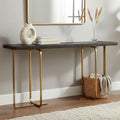 Black and grey oak veneer console table with brushed gold base styled in a hallway beneath a round mirror