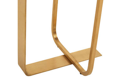 Close-up of the brushed gold stainless steel leg joint on the console table base
