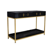Angled studio view of the hair-on-hide console table showing the slim gold metal legs