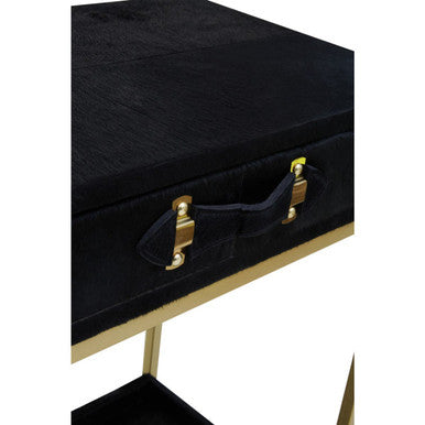 Detail shot of the drawer edge where the hair-on-hide facing meets the wood body