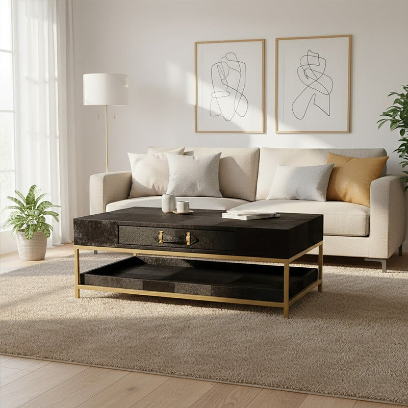 Hair-on-hide coffee table in a styled lounge with a metallic tray on top