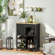 Kitchen trolley styled with wine bottles and glasses on top, cabinets open showing decanter and glassware
