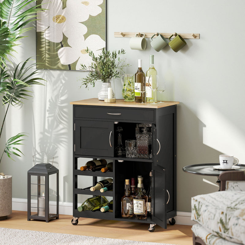 Kitchen trolley styled with wine bottles and glasses on top, cabinets open showing decanter and glassware