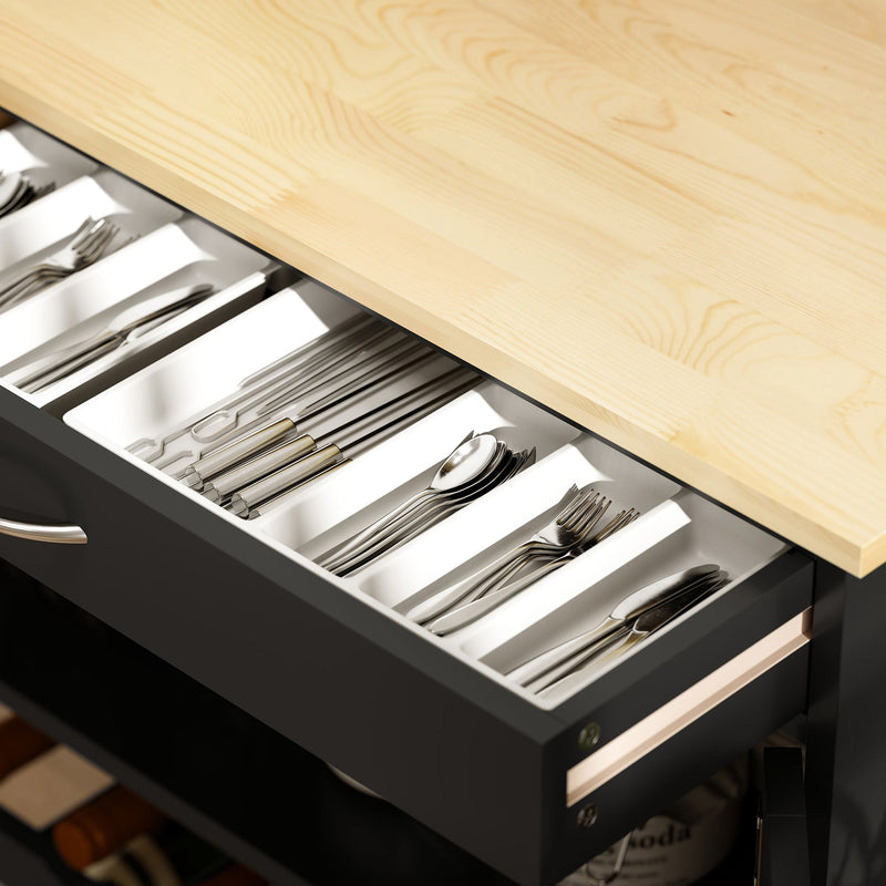 Close-up of the open drawer with a cutlery divider tray
