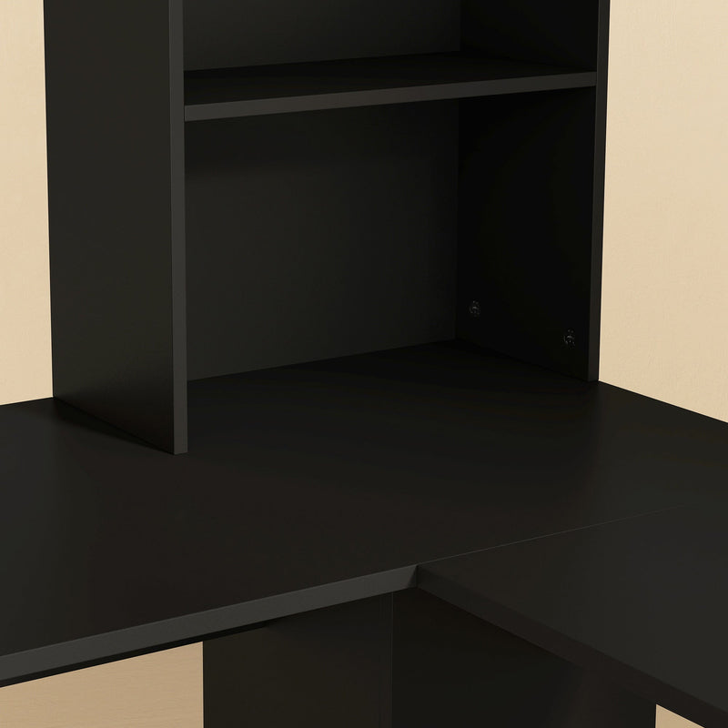 Close-up of the black desk top and upper shelf