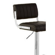 Close-up of black leather effect channel stitching on bar stool seat
