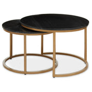 Round black marble nesting coffee tables shown tucked together in a single footprint