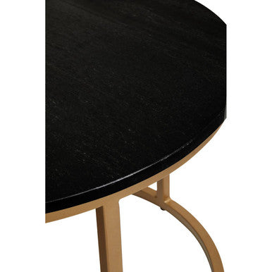Close-up of the natural veining across the deep black marble tabletop