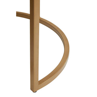 Close-up of the gold-finish iron frame where it meets the marble top