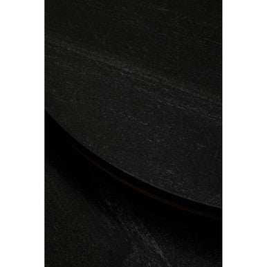 Detail of the gold iron leg and circular base ring of the nesting coffee table