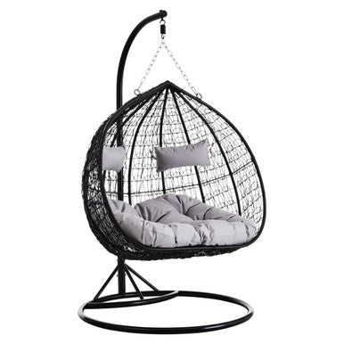 Black rattan double hanging chair with grey cushions, plain background