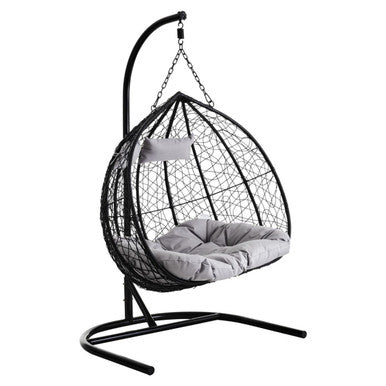 Black rattan double hanging chair with grey cushions, plain background