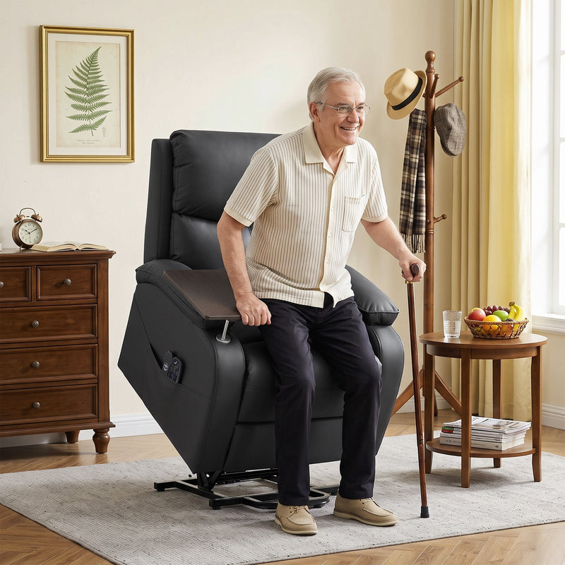 Man using a cane to stand up from the lifted black riser recliner chair