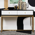Black and white two drawer console table with gold sledge base in a styled hallway