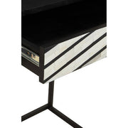 Close-up of the cast floral drawer knob on the bone inlay console table