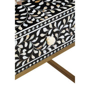 Close-up of the black case edge and inlay border detailing