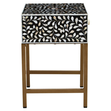 Angled view of the bone inlay side table with the drawer closed