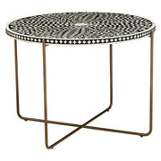 Angled studio shot showing the round top and 50cm height of the coffee table