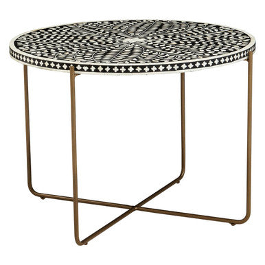 Angled studio shot showing the round top and 50cm height of the coffee table