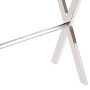 Close-up of the polished silver stainless steel leg where the crossed uprights meet