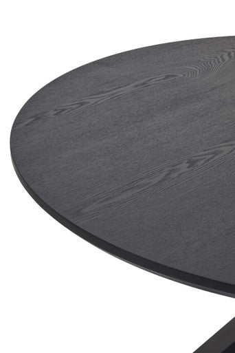 Close-up of the matte black star-shaped table base