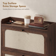 Raised-edge top surface of the shoe cabinet holding keys, a wallet and decor
