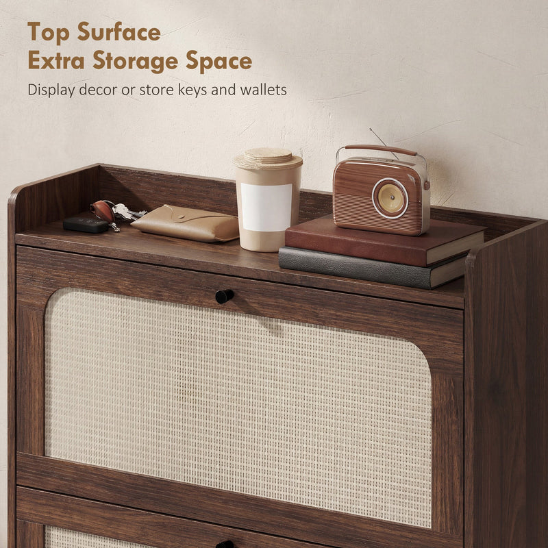 Raised-edge top surface of the shoe cabinet holding keys, a wallet and decor