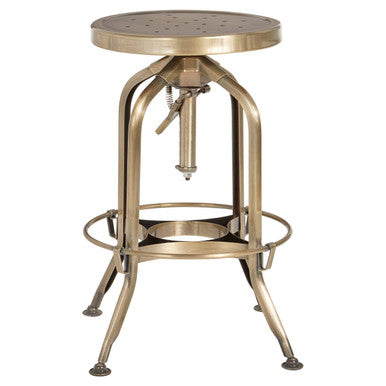 Brass finish steel bar stool on a plain background