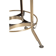 Close-up of brass bar stool footrest and base