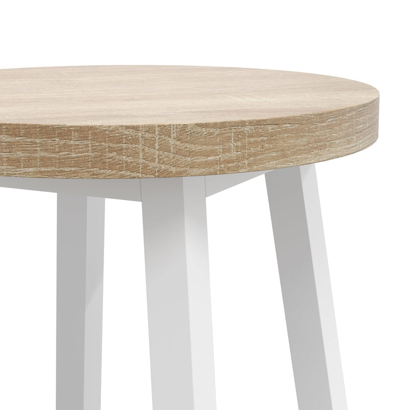 Close-up of the round oak-effect stool seat and white metal legs