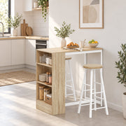 Breakfast bar table and stools in a bright kitchen with jars and plates on the side shelves