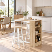 Breakfast bar table with a stool in a kitchen dining area next to a dining table